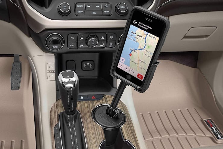 A photo of the interior of a car with a view of the CupFone XL, one of the best cup holder phone mou...