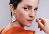 Emma Watson debuted a pixie haircut with baby bangs in a new advertisement for Prada Beauty's upcomi...