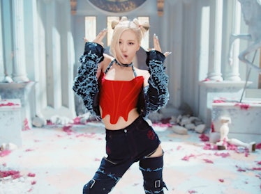 Rosé wearing a bright red corset in Blackpink's 'Pink Venom' music video