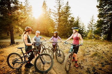 Female bikers gathered outdoors