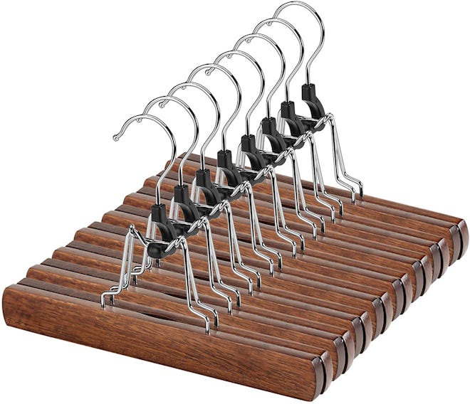 These wooden skirt hangers clamp skirts gently without leaving marks. 