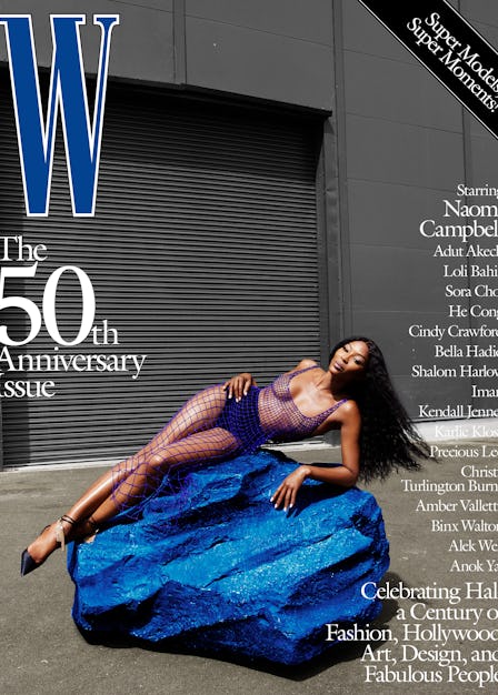 Naomi Campbell in a blue fishnet dress on the cover of W Magazine's 50th anniversary issue