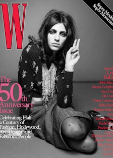 Loli Bahia in a blouse, skirt, necklace, and thights on the cover of W Magazine's 50th anniversary i...