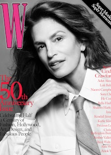 Cindy Crawford wears a Louis Vuitton shirt and tie.