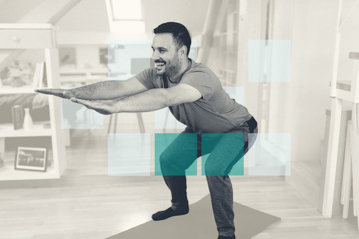 A dad semi-squatting with his hands stretched to get back in shape