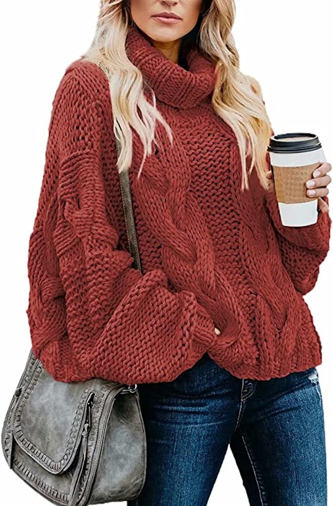 This cable-knit turtleneck sweater is so comfy, you'll never want to take it off.