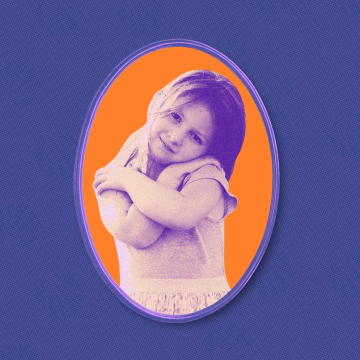 Little girl hugging herself, thinking about how bullying made her hate her body