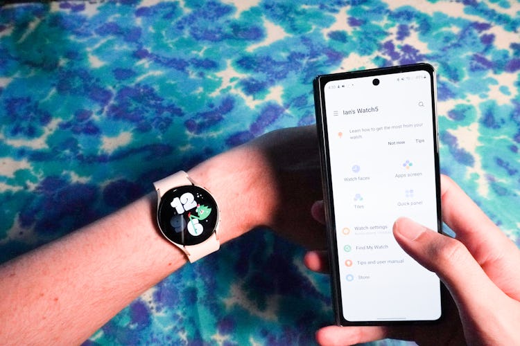 The Galaxy Watch 5 and the Samsung Wearable app on a Galaxy Z Fold 4.