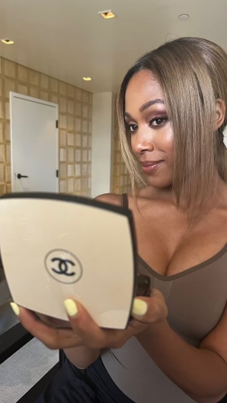 Nicole Beharie in the makeup chair with a chanel palette