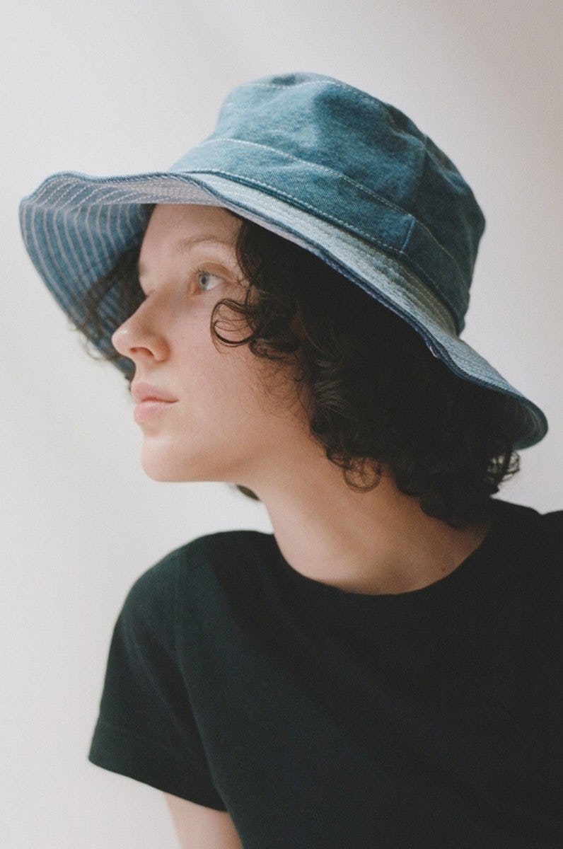 Fall 2022 Denim Trends Are All About Maxi Skirts, Accessories, & Matching Sets