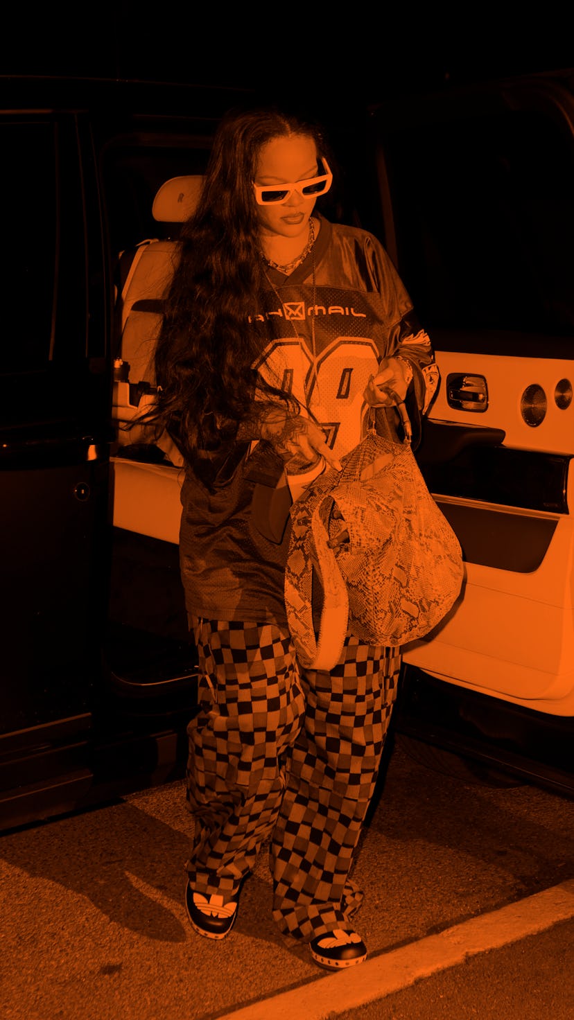 Rihanna and A$AP Rocky cut a stylish figure as they head to an office building in Manhattan.