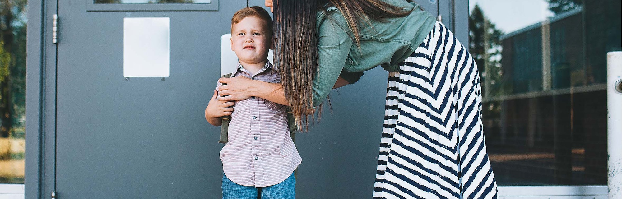 A child experiences restraint collapse while a teacher is helping him put on his backpack.