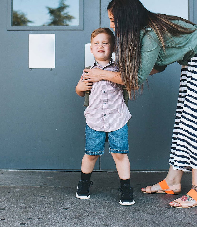 A child experiences restraint collapse while a teacher is helping him put on his backpack.