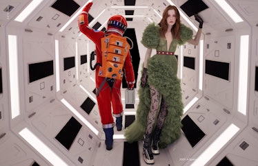 A model standing next to an astronaut in a Gucci campaign inspired by '2001: A Space Odyssey'