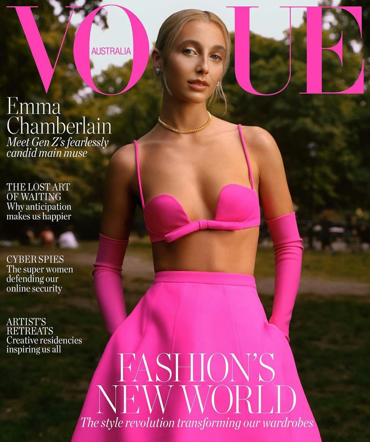 emma chamberlain poses in a hot pink valentino look on the cover of vogue australia