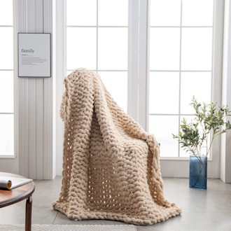 This chunky knit blanket is highly rated by Amazon reviewers. 
