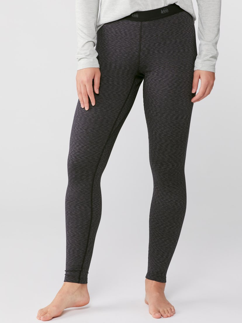 Woman wearing REI midweight base layer tights, a Labor Day sale find