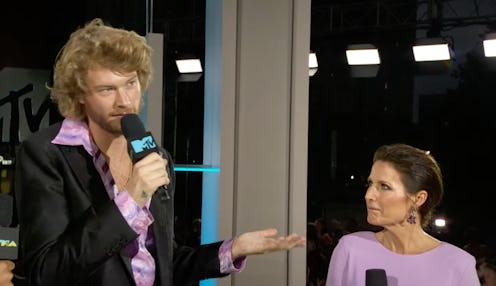 Yung Gravy and Sheri Easterling arrive together at the 2022 VMAs.
