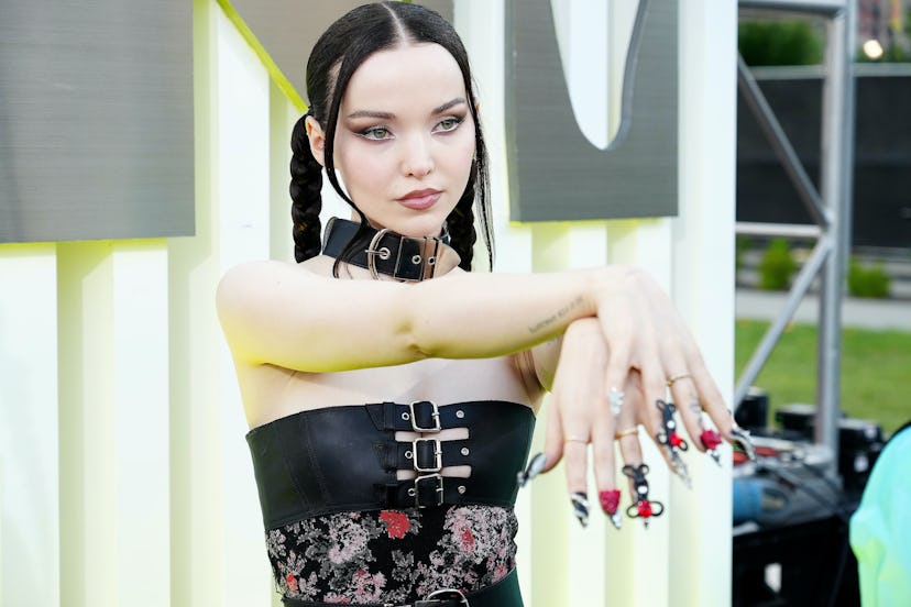 Paging Edward Scissorhands. Dove Cameron's 3D nails were one of the best manicures on the 2022 MTV V...
