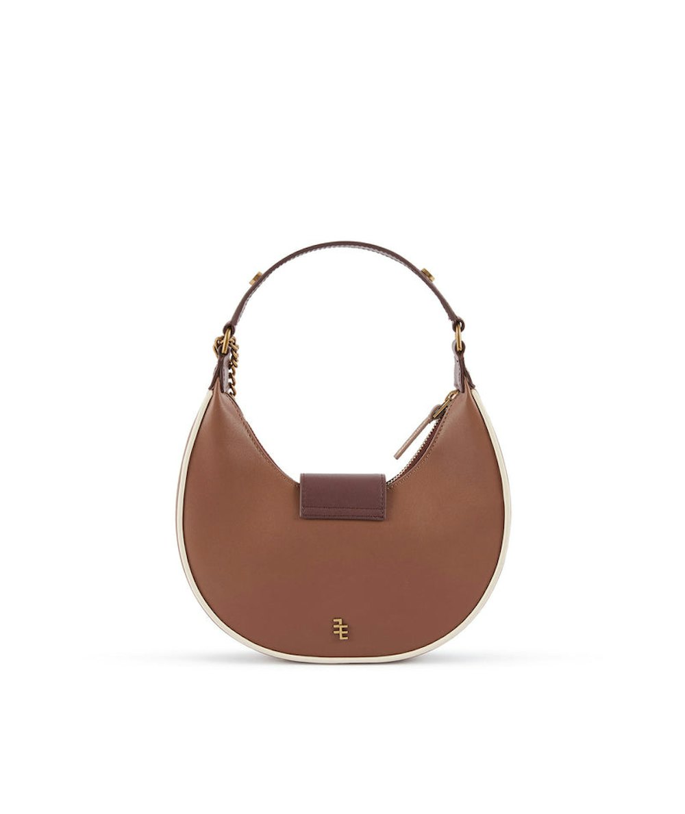 The new moon-shaped handbag handbags simple and stylish beach