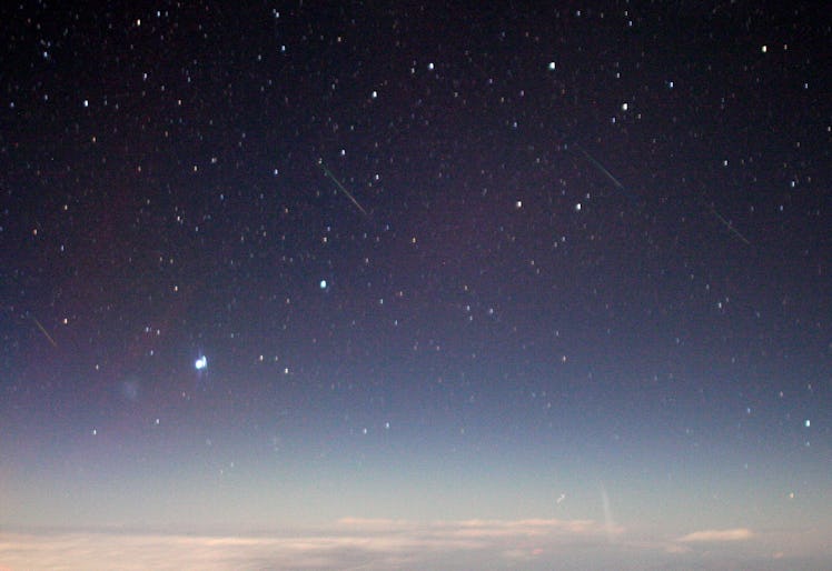Color photo of stars and meteors in the night sky