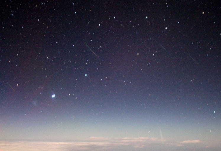 Color photo of stars and meteors in the night sky