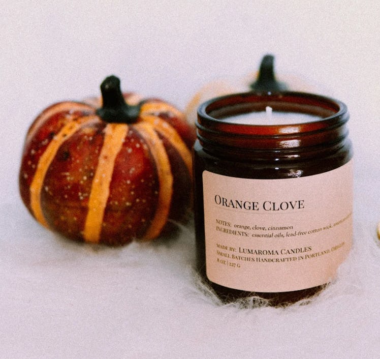 The Amber Orange Clove Candle is one of the coziest fall candles to try from Etsy.