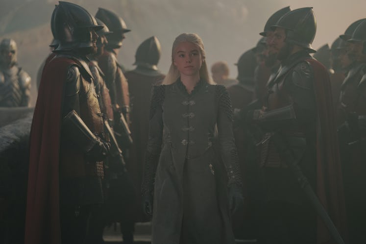 Rhaenyra Targaryen (Milly Alcock) walks through a group of soldiers in House of the Dragon Episode 2