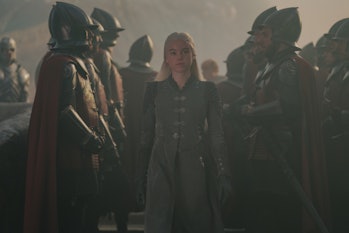 Rhaenyra Targaryen (Milly Alcock) walks through a group of soldiers in House of the Dragon Episode 2