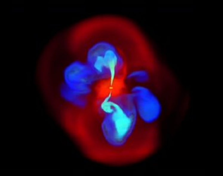 Image of a simulated supermassive black hole in reds and blues on a black background.