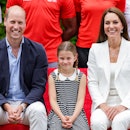Britain's Princess Charlotte of Cambridge (C), Britain's Prince William, Duke of Cambridge (L) and B...