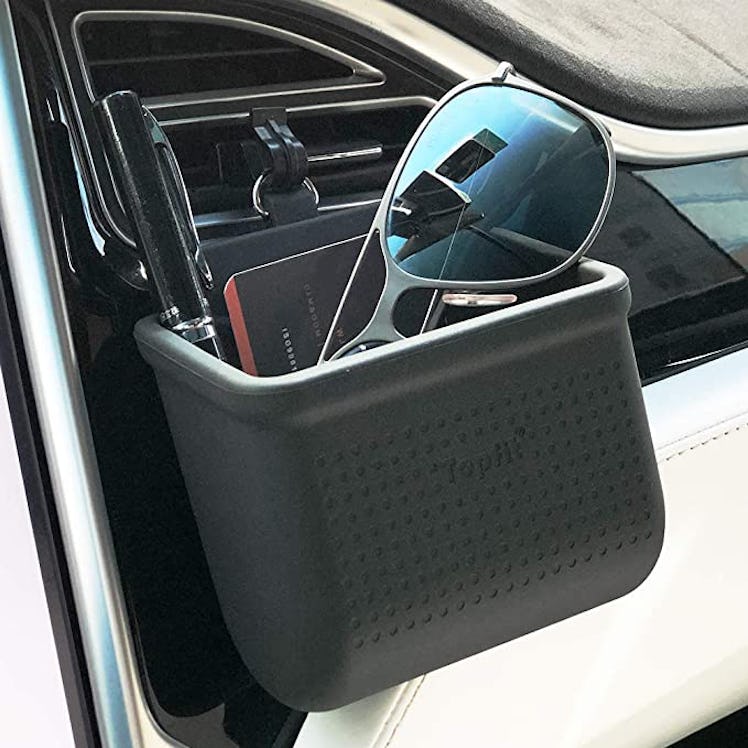 This car vent holder is one of the car organization hacks that'll make your car look cleaner. 
