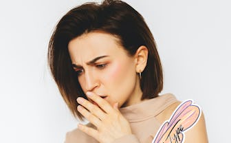 Confused millennial woman isolated on white studio background hold smartphone have problem with gadg...