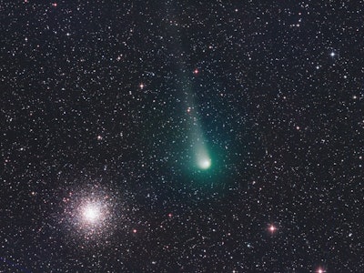 Comet K2 PanSTARRS passes near the globular cluster Messier 10 in early July 2022.