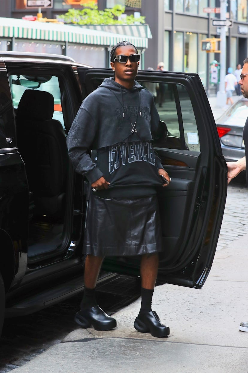 A$AP Rocky exiting a car in NYC wearing a cool leather skirt