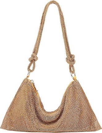 a slouchy, glittery shoulder bag with knotted straps