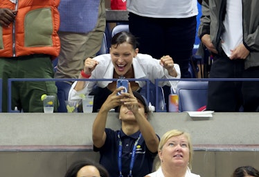 Bella Hadid cheering in the stands of Serena Williams's US Open match