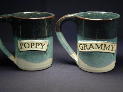 Dark green and sea green mugs customized with grandparents' names is a great grandparents day gift.