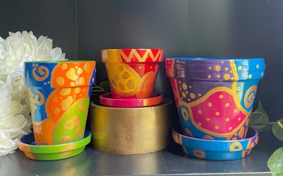 Terracotta pots with colorful abstract art and designs make a perfect Grandparents day gift for the ...