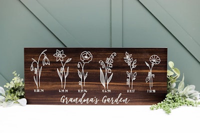 This customizable wooden garden sign says grandma's garden and lists six grandchildren's names and t...
