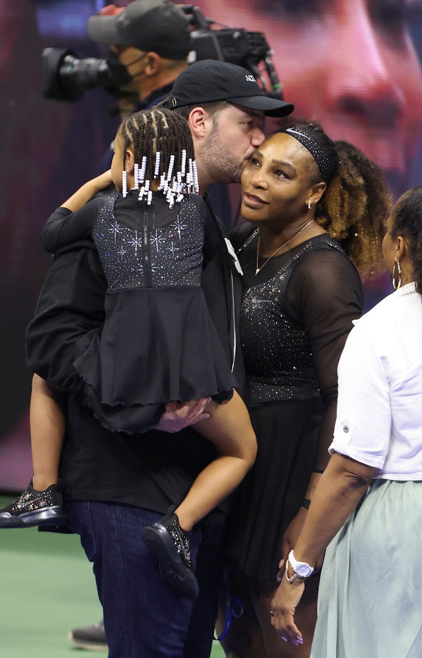 Serena Williams with her husband and daughter at a match