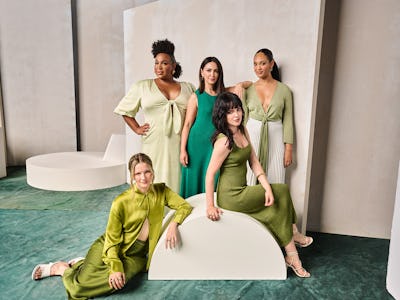 Actresses from The Lord of the Rings: The Rings of Power all wearing modern day green outfits.