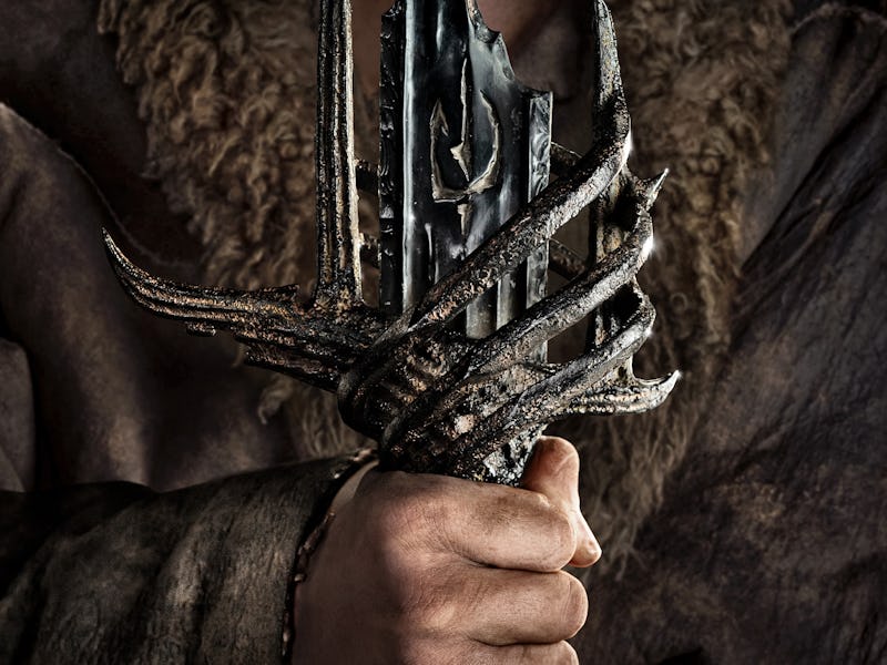 Teaser poster for 'The Lord of the Rings: The Rings of Power,' featuring Tyroe Muhafidin carrying hi...