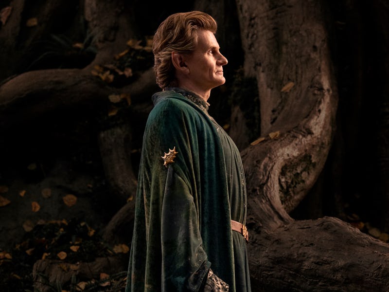 Charles Edwards stands in a forest as Celebrimbor in The Lord of the Rings: The Rings of Power