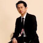 Steven Yeun wearing a floral necktie