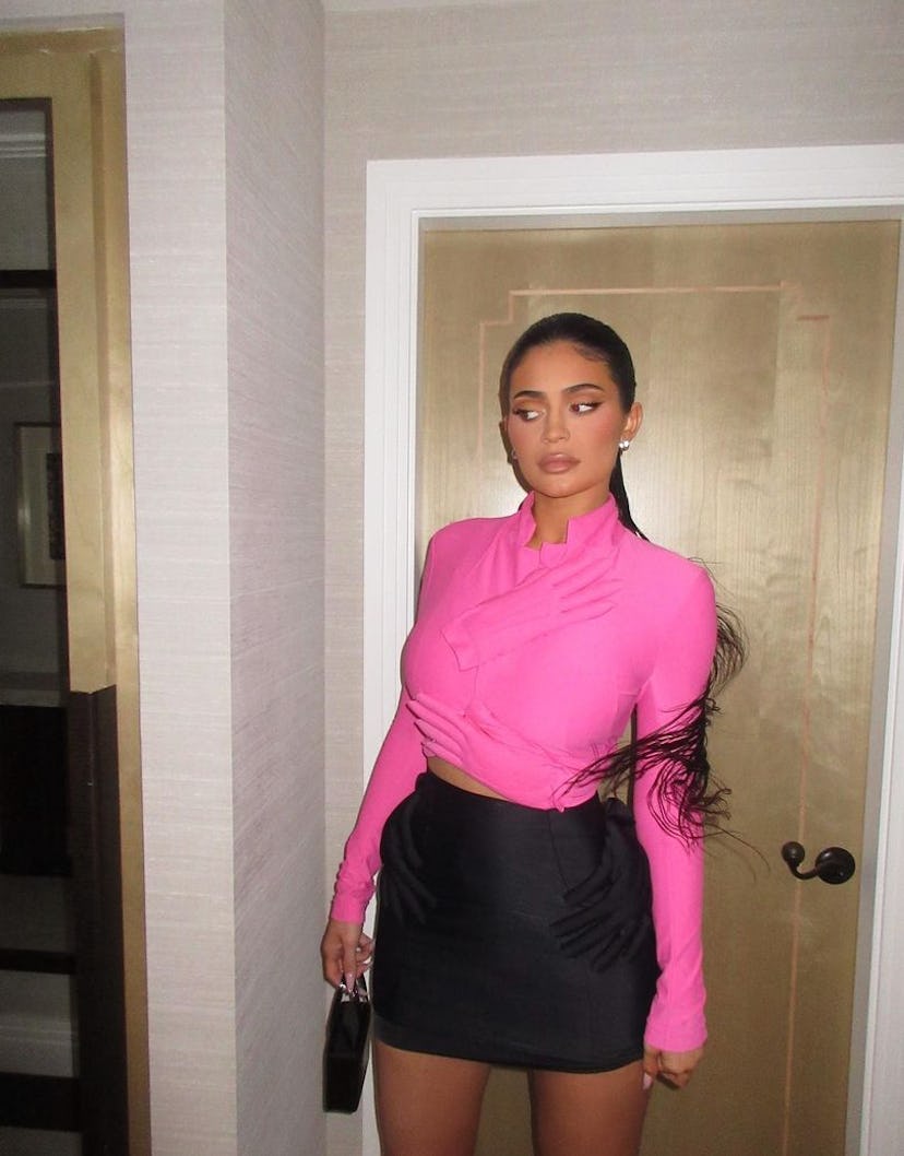 Kylie Jenner in a pink Commes des Garcon ensemble