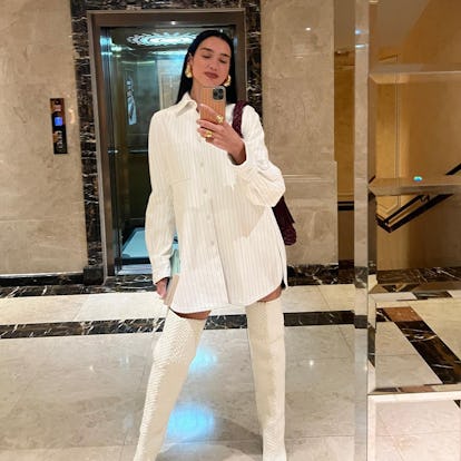 Dua Lipa wearing an all white ensemble