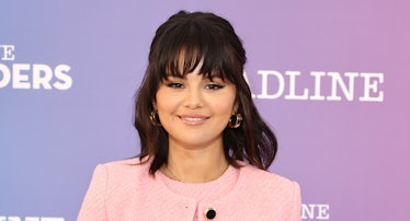 Selena Gomez wearing a pale pink ensemble