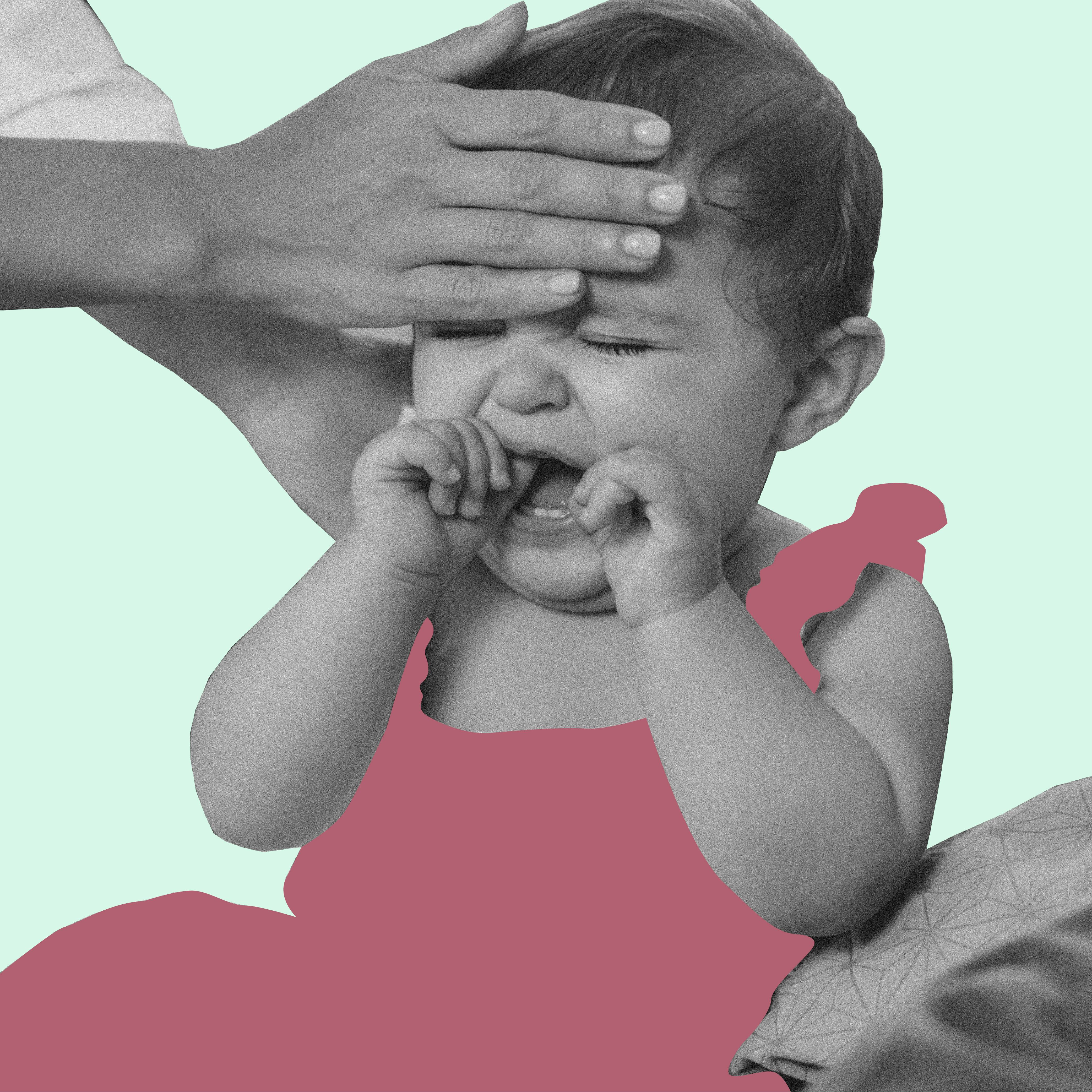 Mom checking her daughters temperature to see if she has RSV