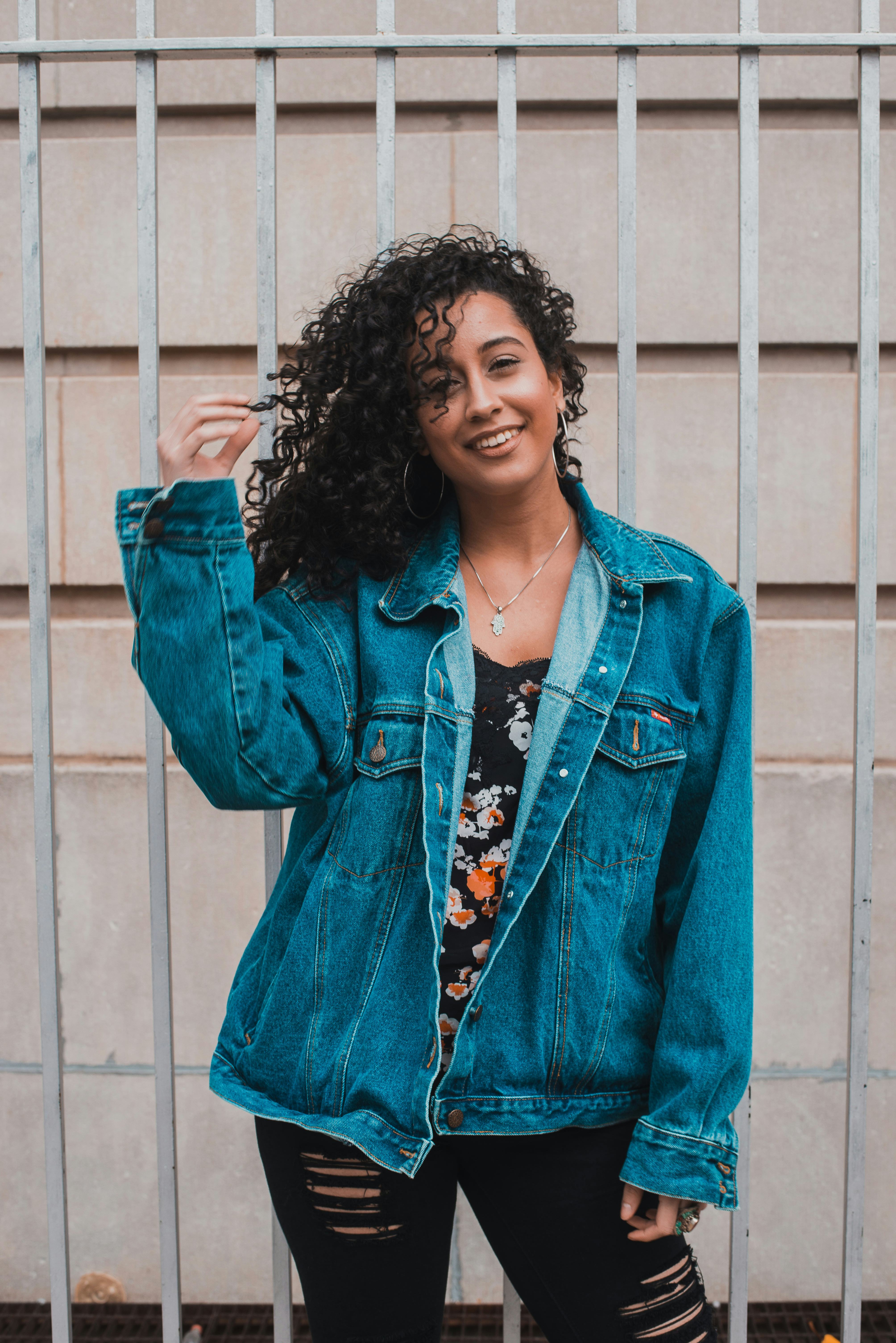 Young woman with her hair tousled during the August 2022 full moon, which will be groundbreaking for...